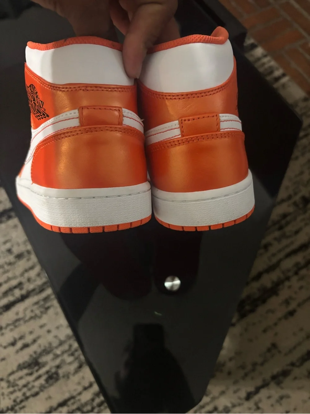 Jordan 1 Mid in White and Metallic Orange